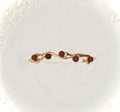 Astra bracelet by Mareas featuring deep red stones