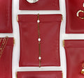 Mareas pouch in wine red color, a soft jewelry case designed for travel and everyday rituals.